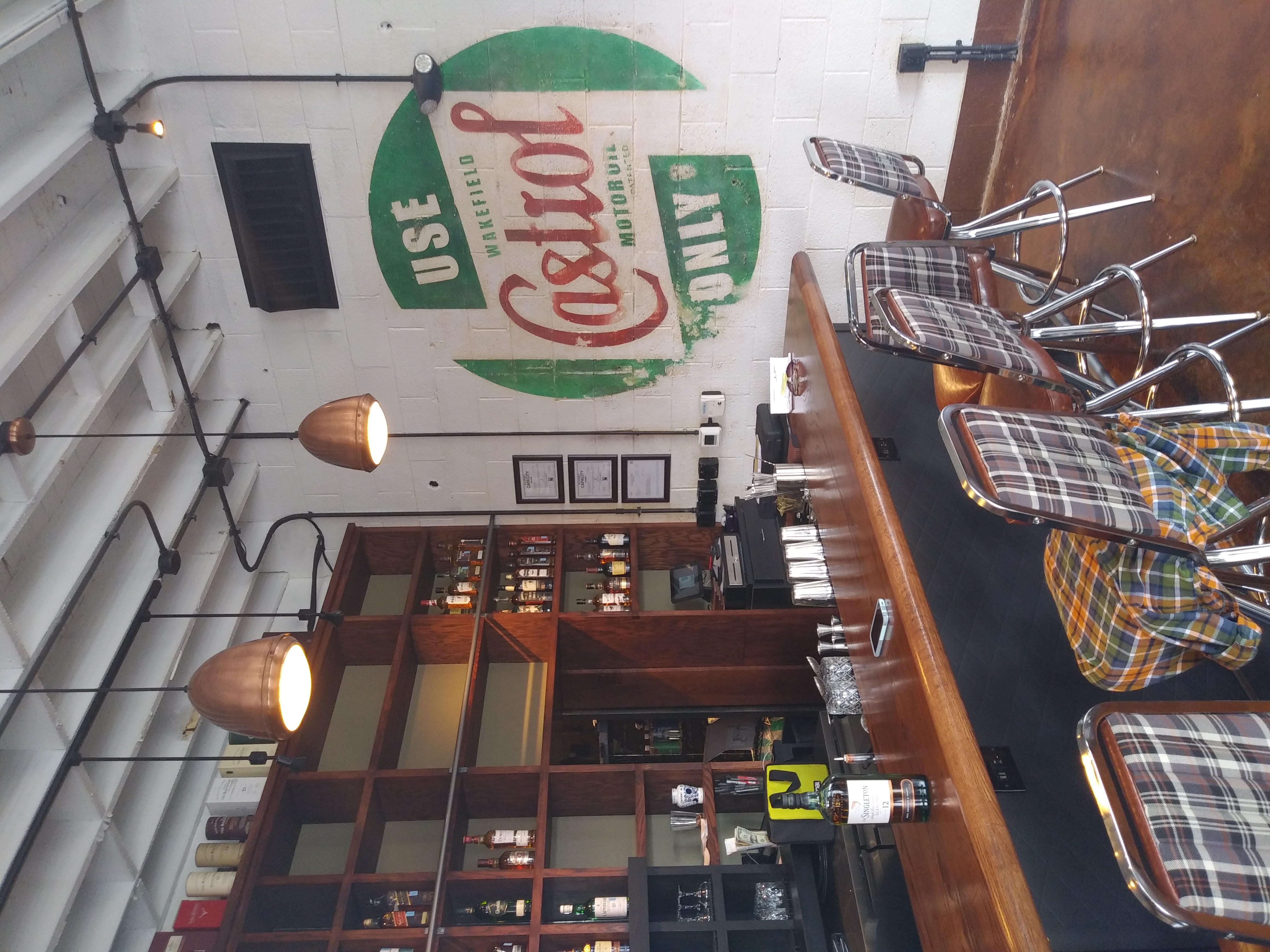 Vintage Castrol motor oil mural — interior commercial space