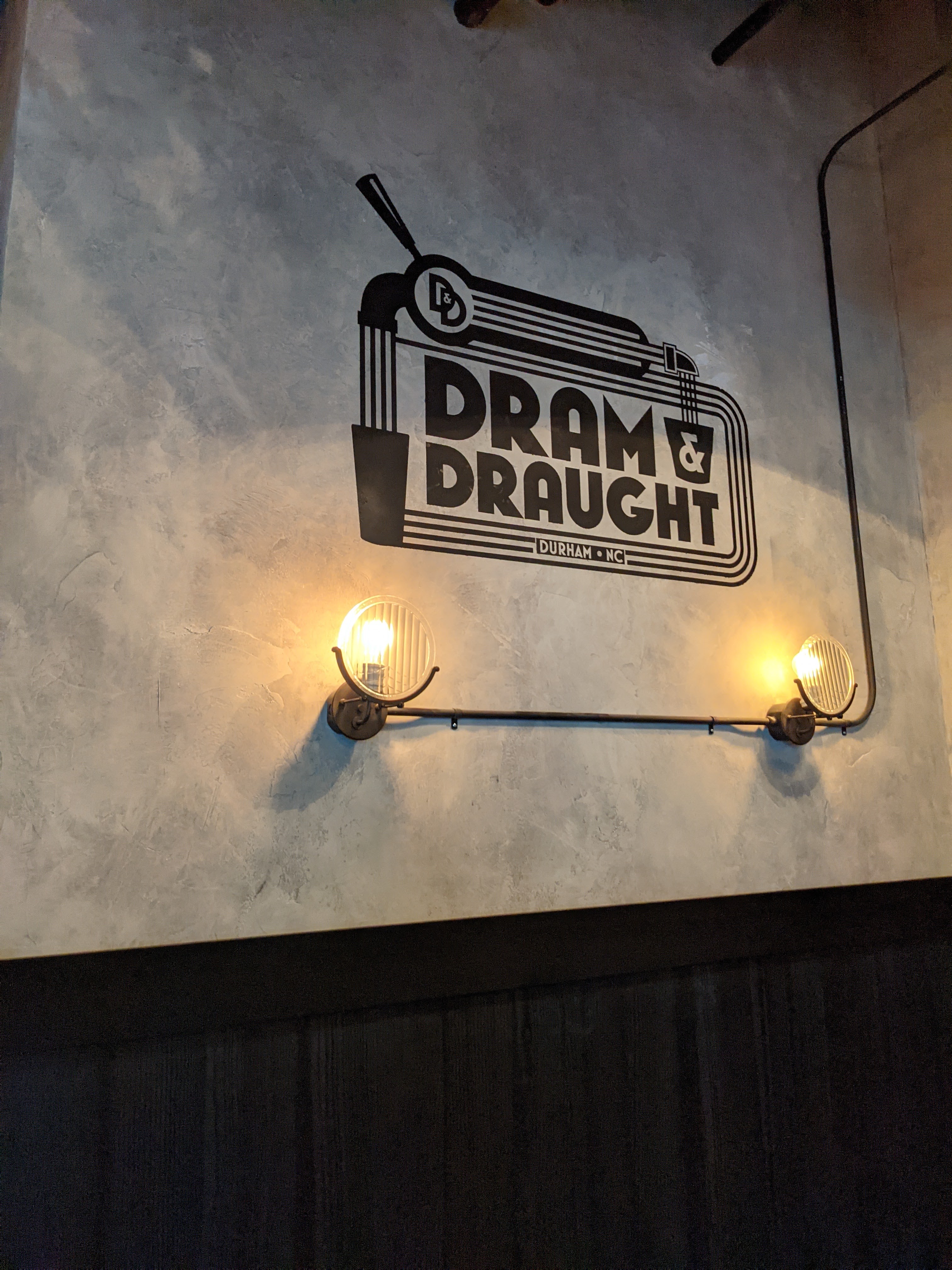 Venetian plaster with hand-painted sign, Dram and Draught, Durham NC