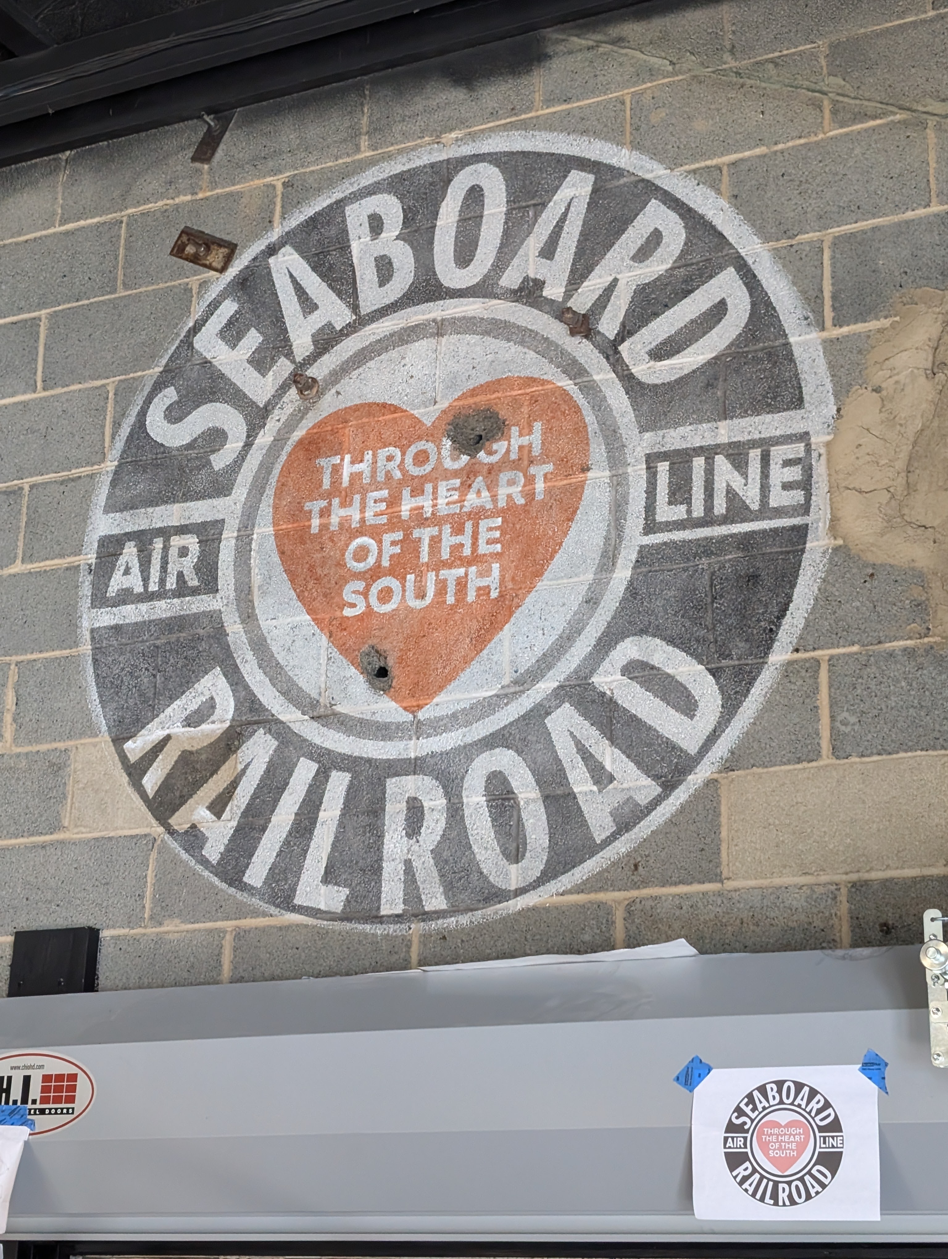 Seaboard Air Line Railroad heritage mural — hand-painted on cinder block